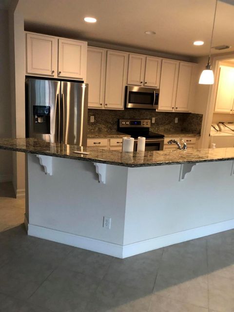 Photo of 10320 SW Stephanie Way #7210, Port Saint Lucie, FL 34987 (MLS # R11135326)