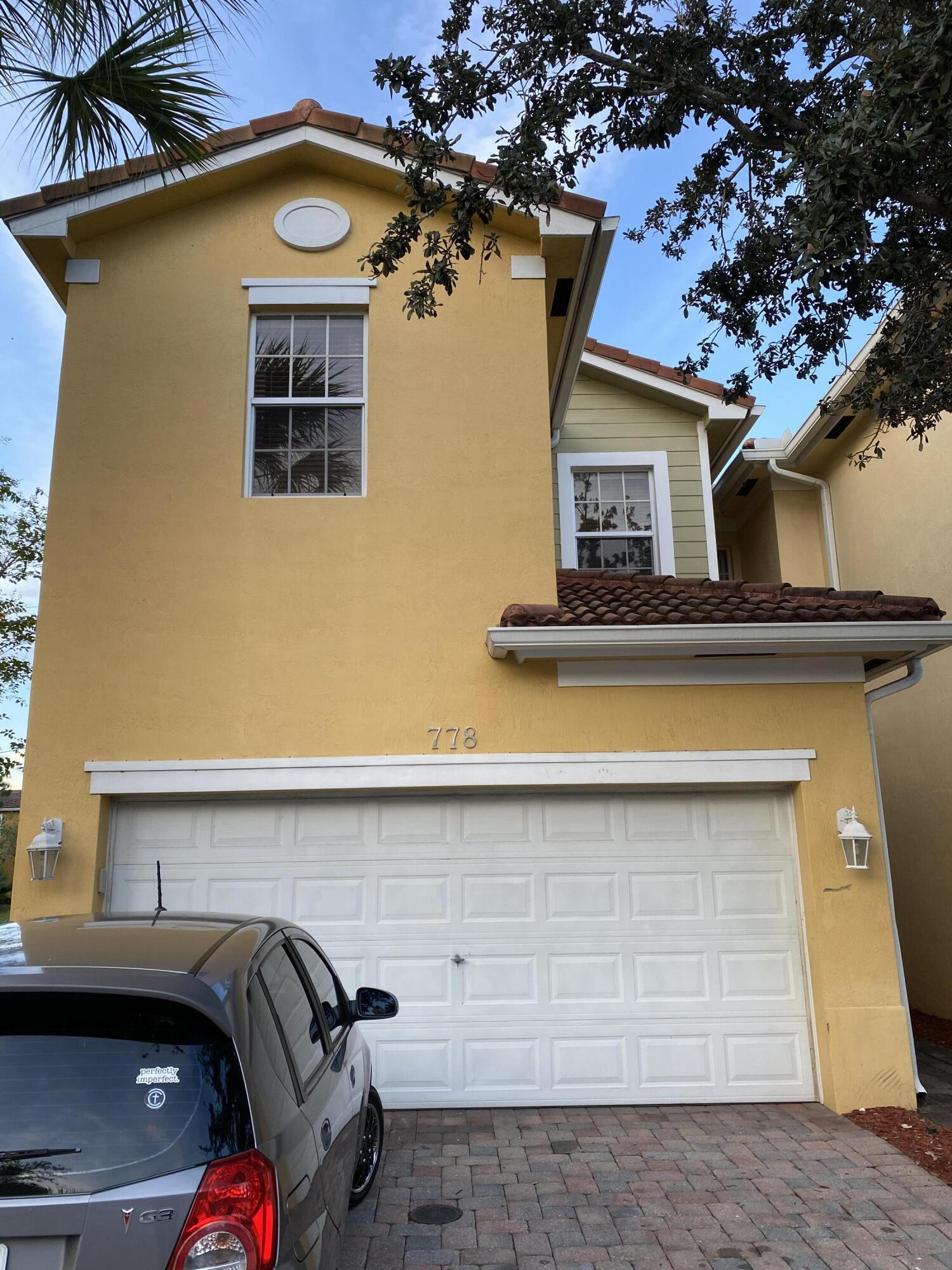 CORNER LAKE FRONT TOWNHOME WITH VIEW OF ENTRY AND LAKE FOUNTAINS. TWO CAR GARAGE TOWNHOUSE. LARGE WALK-IN LAUNDRY ROOM WITH FULL SIZE WASHER/DRYER WITH LOTS OF STORAGE SPACE AND SHELVING. SS APPL'S, GRANITE COUNTER TOP. TOTALLY UPGRADED THRU-OUT-AMENITIES INCLUDED: COMMUNITY-POOL,TOT LOT, FIRE SPRINKLERS, SMOKE DETECTORS,.AUTO GARAGE DOOR OPENER, LAWN MAINT.(ALL INCLUDED) THIS LOVELY TOWNHOME IS TILED UP WHOLE HOUSE.