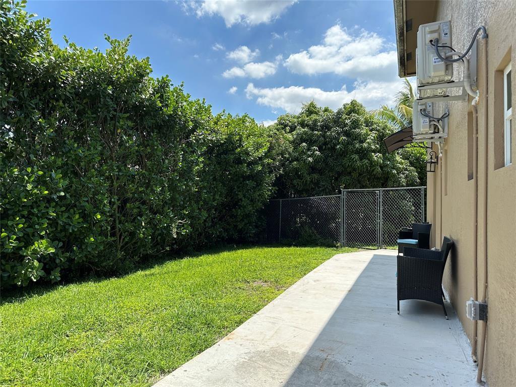 ALL UTILITIES INCLUDED! Beautiful 2BR/2BA apartment in Davie with private gated side entry, set in a separate building for ultimate privacy. This 985 sq ft home boasts a modern kitchen with granite counters, stainless steel appliances, built-in closet systems, wood-look tile floors, updated baths, and impact windows/doors. Relax in your private side yard and enjoy the convenience of an on-site laundry room. Pet friendly! Ideally located near major highways, shopping, and dining. Quiet, move-in ready, and packed with upgrades—schedule your showing today!