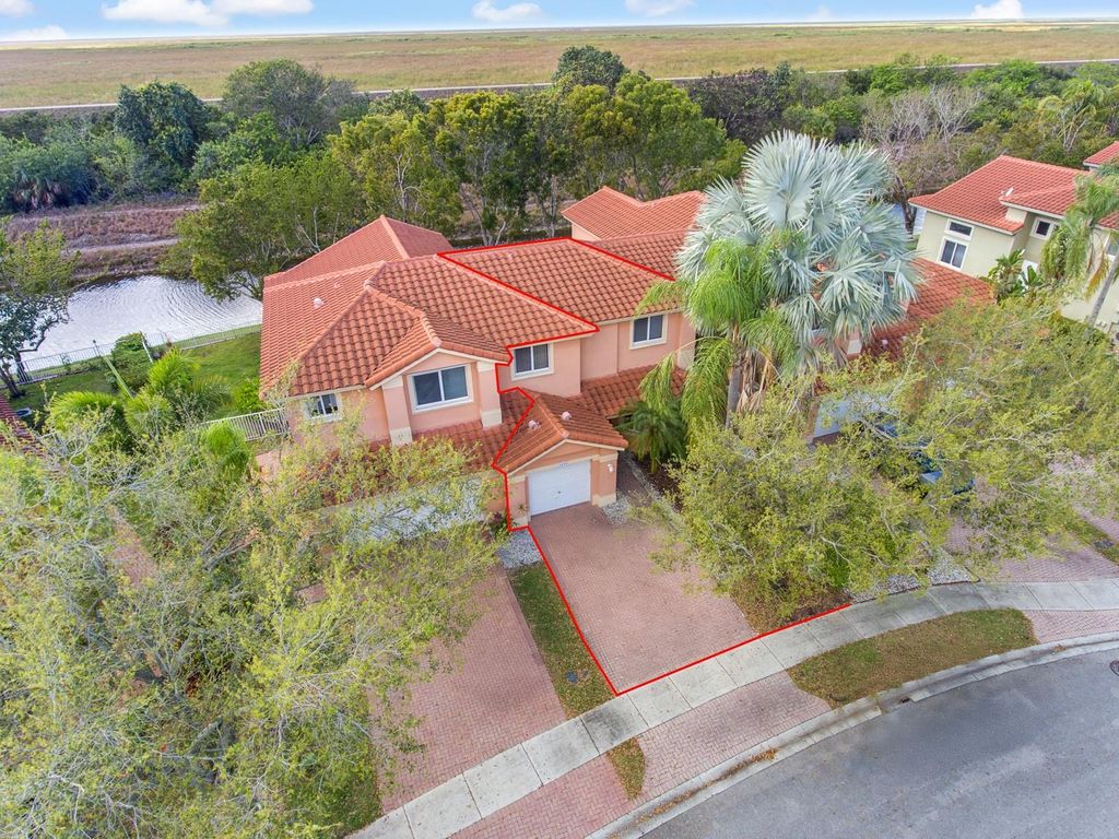 Photo of 5640 NW 127th Terrace, Coral Springs, FL 33076 (MLS # F10489519)