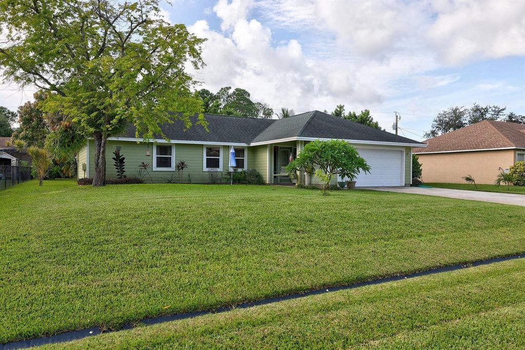 Photo of 1522 SW Hextel Avenue, Port St Lucie, FL 34953 (MLS # R10913242)