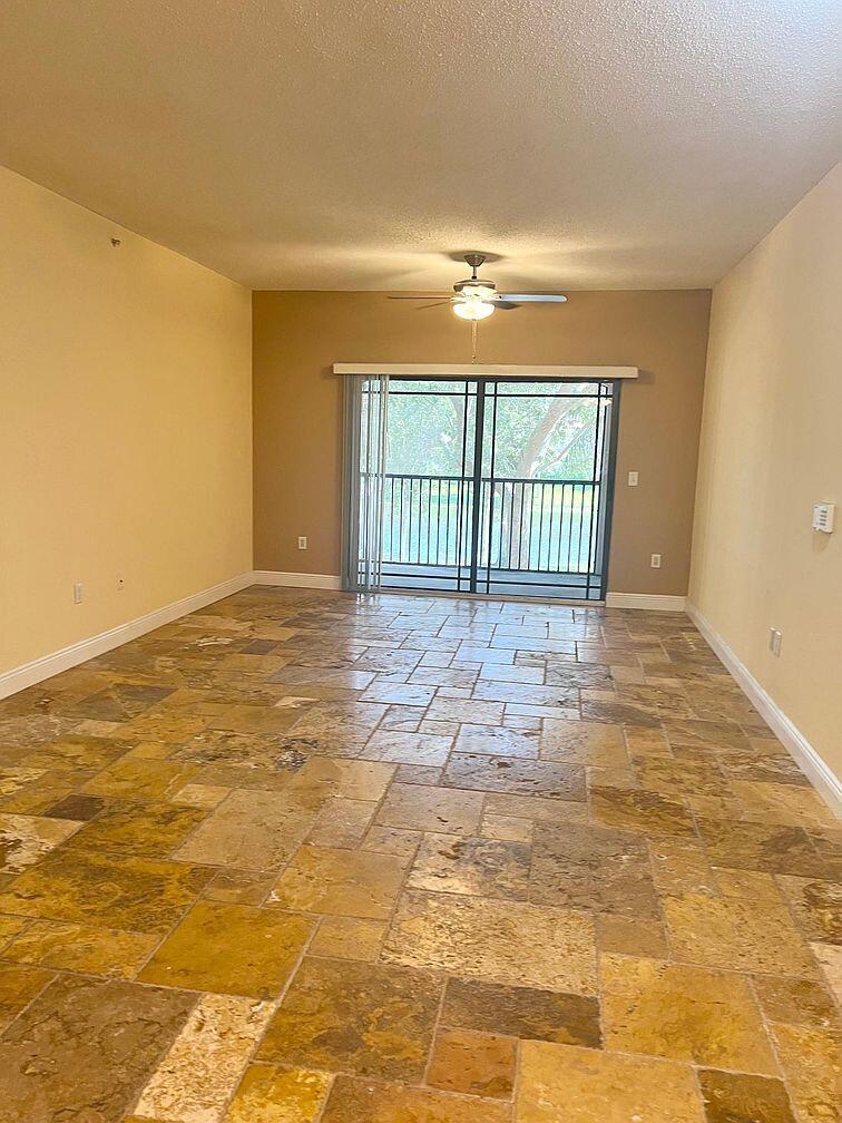 Photo of 3021 Alcazar Place #205, Palm Beach Gardens, FL 33410 (MLS # R11123703)