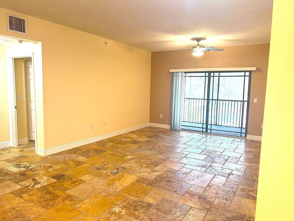 Photo of 3021 Alcazar Place #205, Palm Beach Gardens, FL 33410 (MLS # R11123703)