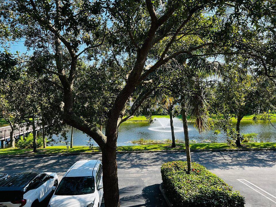 1 bedroom, 1 bath condo featuring beautiful travertine flooring throughout. Brand new refrigerator, dishwasher, and microwave. Enjoy peaceful views of the lake from your screened balcony. San Matera has resort style amenities with a pool, hot tub, fitness center, clubhouse, pickleball, and much more! Centrally located by the Gardens Mall and all that Palm Beach Gardens has to offer in fine dining. Call today for a private showing!