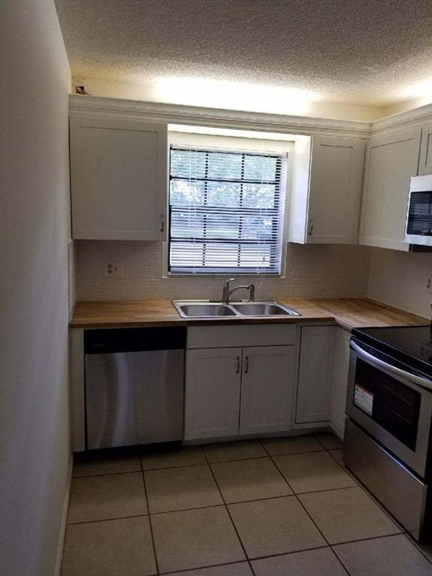 First floor unit . Gated community. Great location, close to FAU
