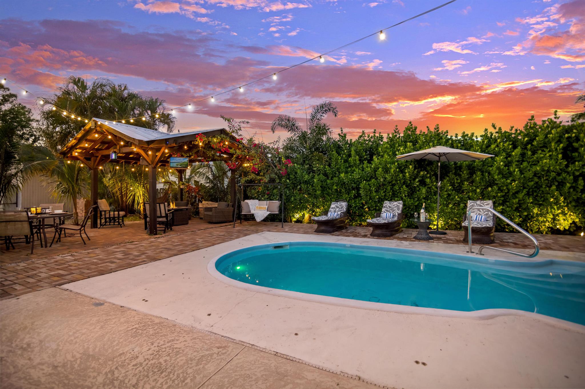Escape to this cozy 3 bedrooms, 2 bathrooms, on a private 1/2 acre. Enjoy a heated pool for year-round use and a whole house water filtration system for clean drinking water and showers. Relax in the landscaped backyard with a gazebo and take advantage of the fully fenced yard for added privacy and security. The home comes fully furnished and offers parking for standard vehicles, including trucks and large cars (not suitable for semi-trucks or box trucks).