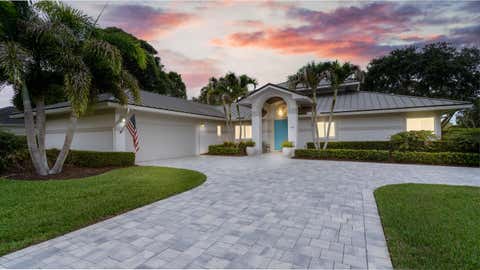 Photo of 6385 SE BALTUSROL Terrace, Stuart, FL 34997 (MLS # B26055577)