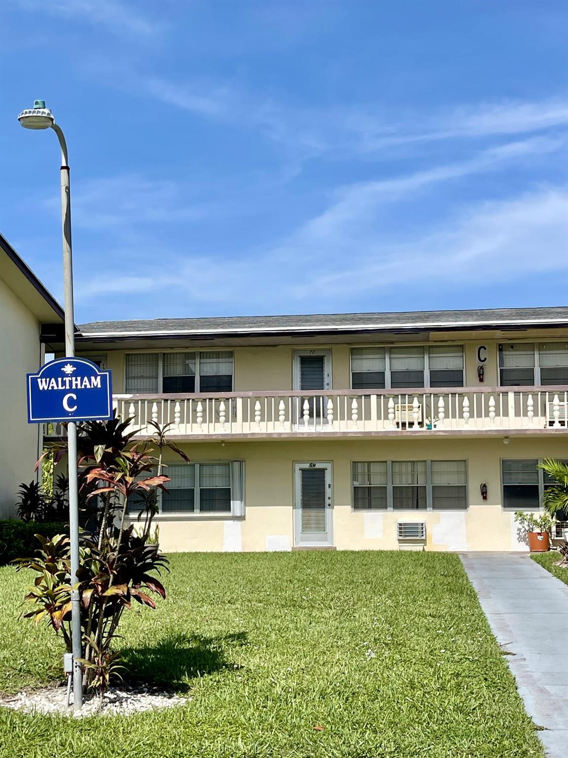 Desirable first floor,1 bedroom, 1 bath condo with covered, screened porch. Large, ceramic tile floors throughout. Nice landscaping privacy in back. Walk to Main Clubhouse, indoor & outdoor pools, pickleball, tennis, full amenities in this gated 55+ community, manned 24/7. Newer roof, up to code replacement of soffits and modern LED hallway lighting, and concrete work on railings. NO loans, NO special assessments. RENTABLE AFTER CLOSING!