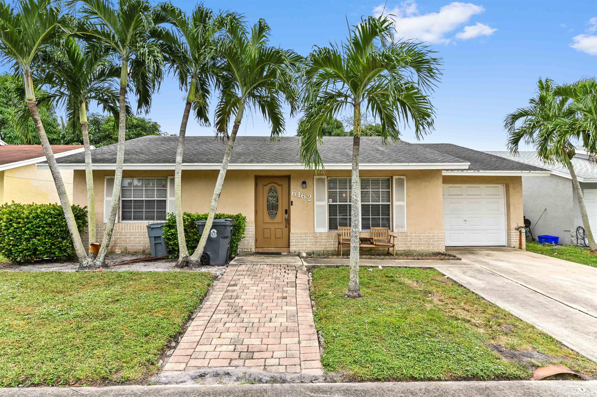 Discover the perfect blend of comfort and style in this charming 4-bedroom, 2-bathroom pool home, nestled within a beautiful community. The property boasts tiled flooring throughout, including the bedrooms, creating a seamless and elegant flow. The kitchen is a true centerpiece, featuring granite countertops, upgraded wooden cabinets, and plenty of space for meal preparation and storage. A dedicated laundry/storage room adds convenience, making daily tasks effortless.