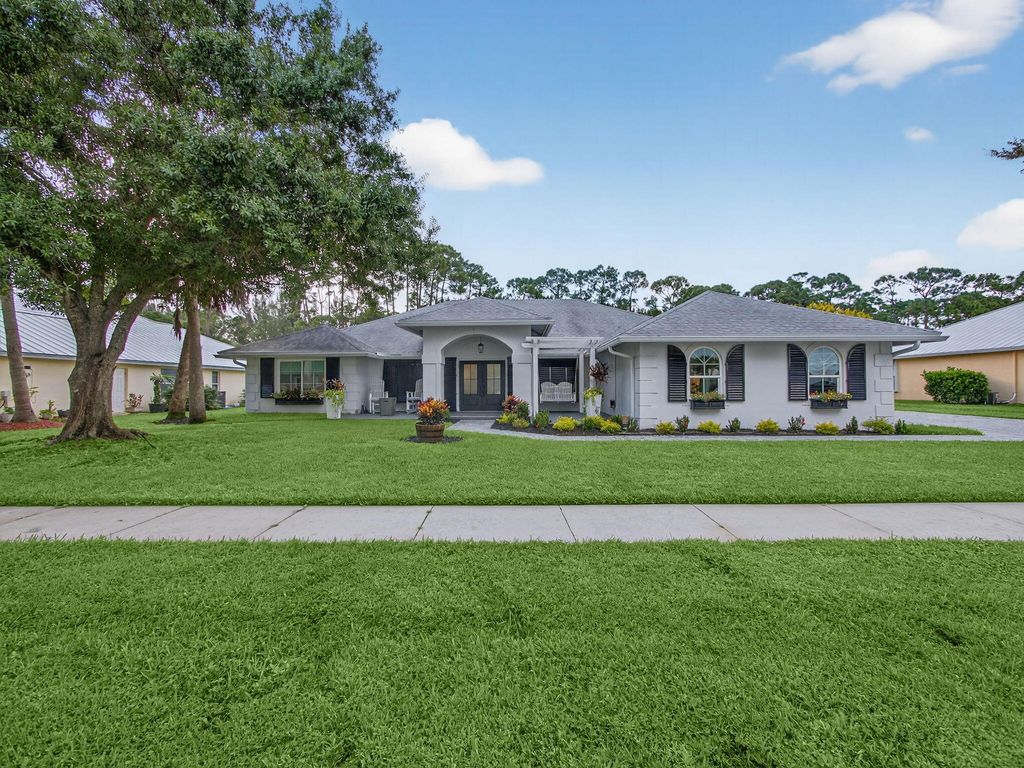 Photo of 8025 SW Yachtsmans Drive, Stuart, FL 34997 (MLS # R11127900)