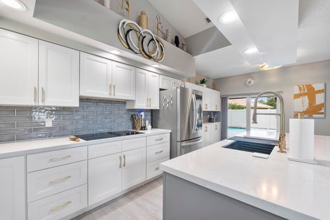 Tiny photo for 5911 NW 60th Avenue, Parkland, FL 33067 (MLS # B26045056)