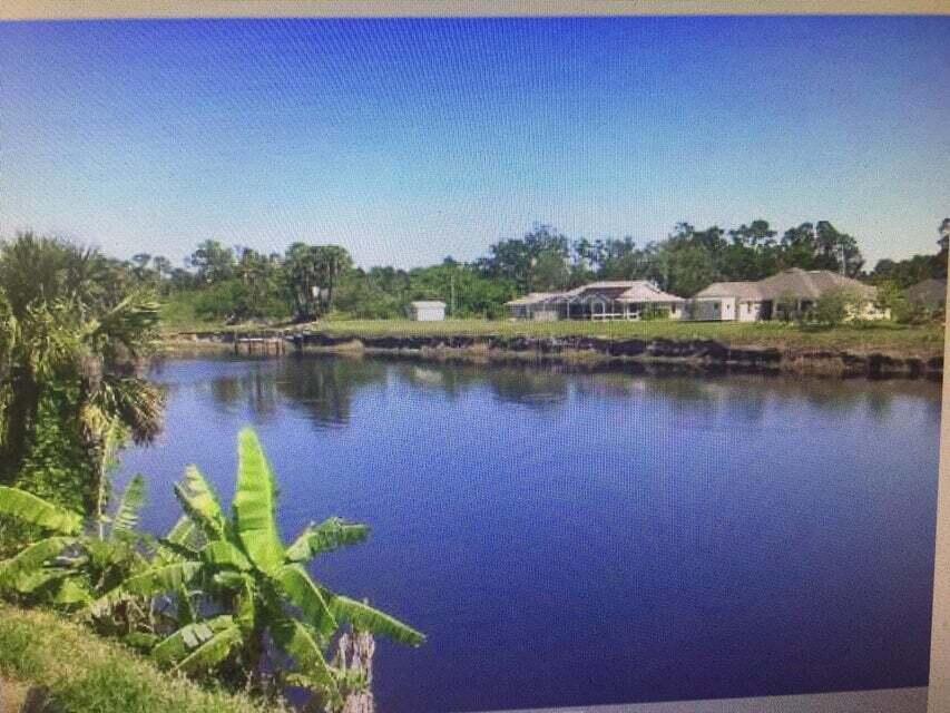 BEAUTIFUL LOT ON C-24 CANAL WITH FRESH WATER FISHING, JET SKIES, BOATINGBUILD YOUR OWN DREAM HOME!