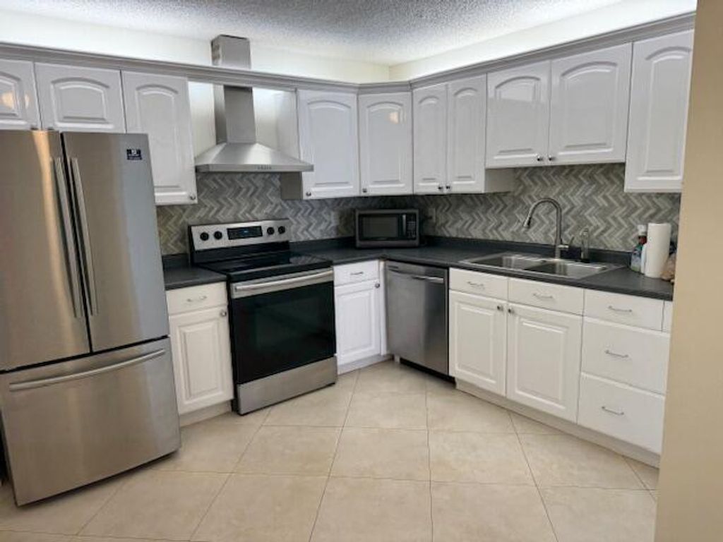 Photo of 9256 Sabal Ridge Circle #D, Boca Raton, FL 33428 (MLS # B26016995)