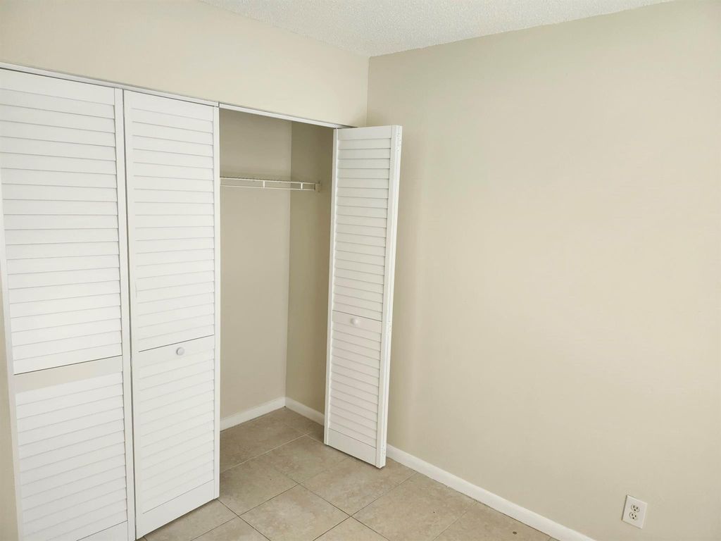 Photo of 621 Cypress Way West Way W, Palm Springs, FL 33406 (MLS # R11118000)