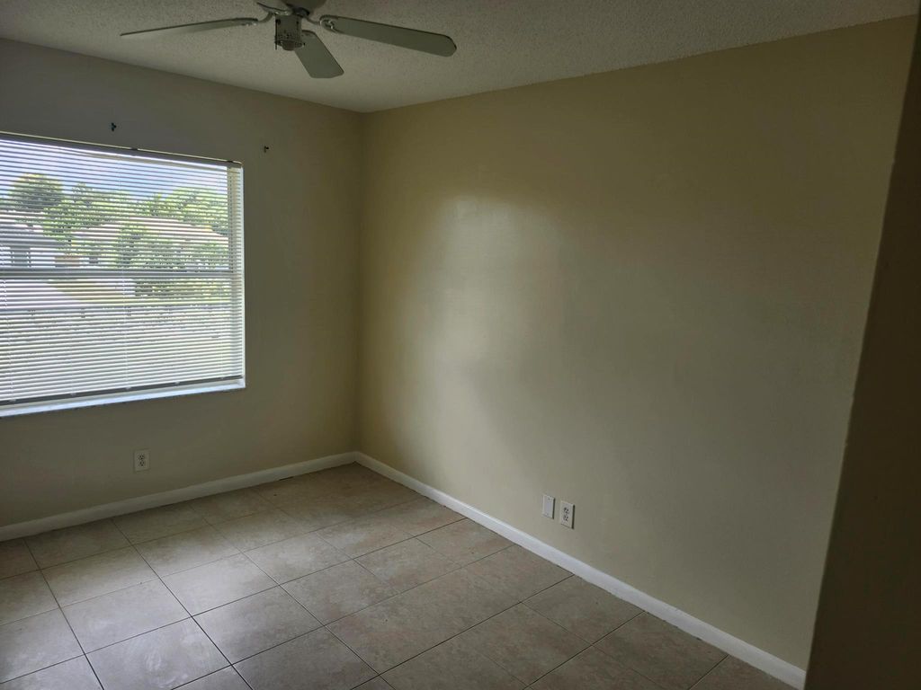 Photo of 621 Cypress Way West Way W, Palm Springs, FL 33406 (MLS # R11118000)