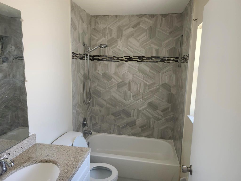 Photo of 621 Cypress Way West Way W, Palm Springs, FL 33406 (MLS # R11118000)