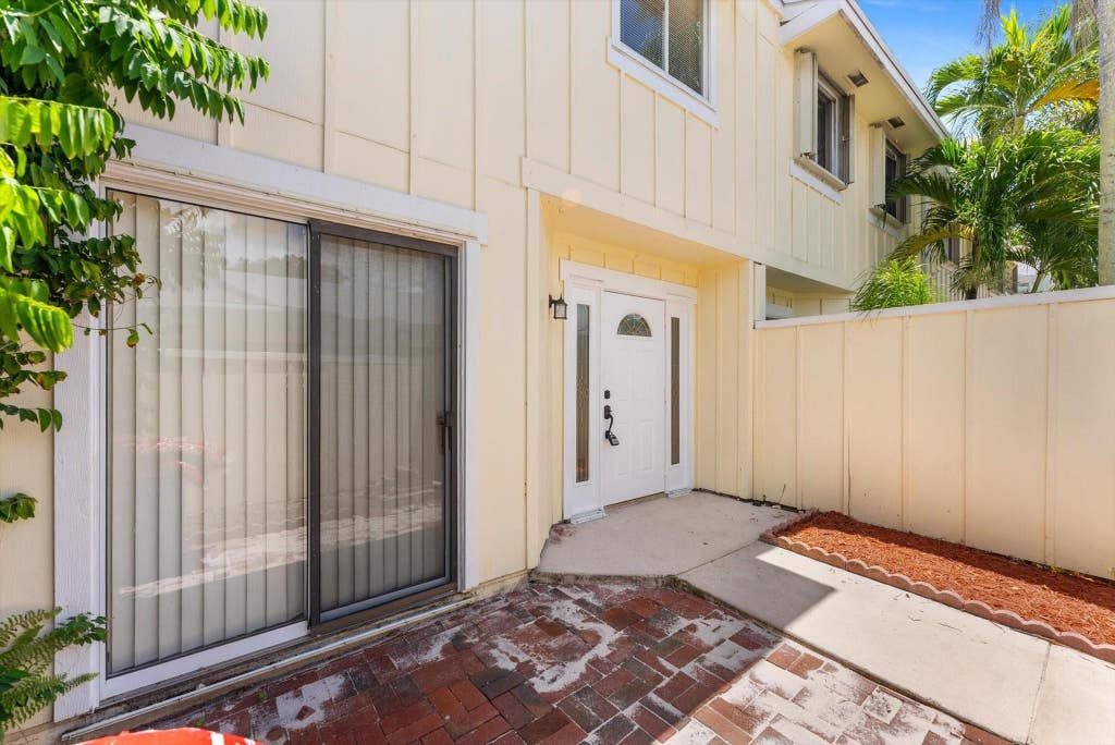 Photo of 6175 RIVERWALK Lane #4, Jupiter, FL 33458 (MLS # B26055907)