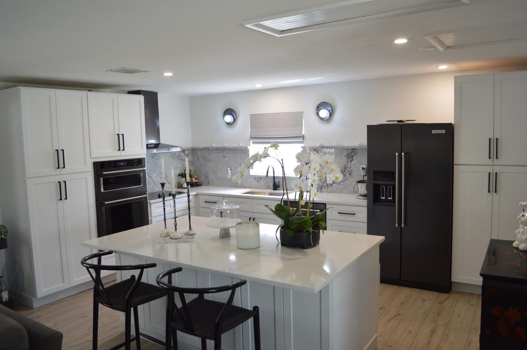 Photo of 520 Flotilla Road, North Palm Beach, FL 33408 (MLS # B26000066)