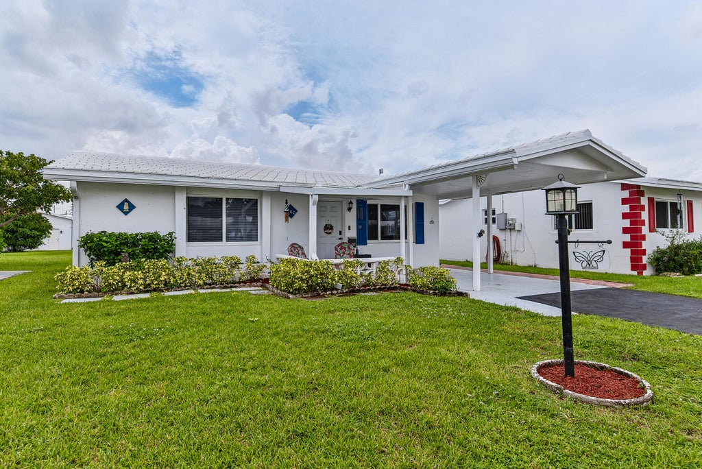 Photo of 100 NW 32nd Court, Pompano Beach, FL 33064 (MLS # B26079517)