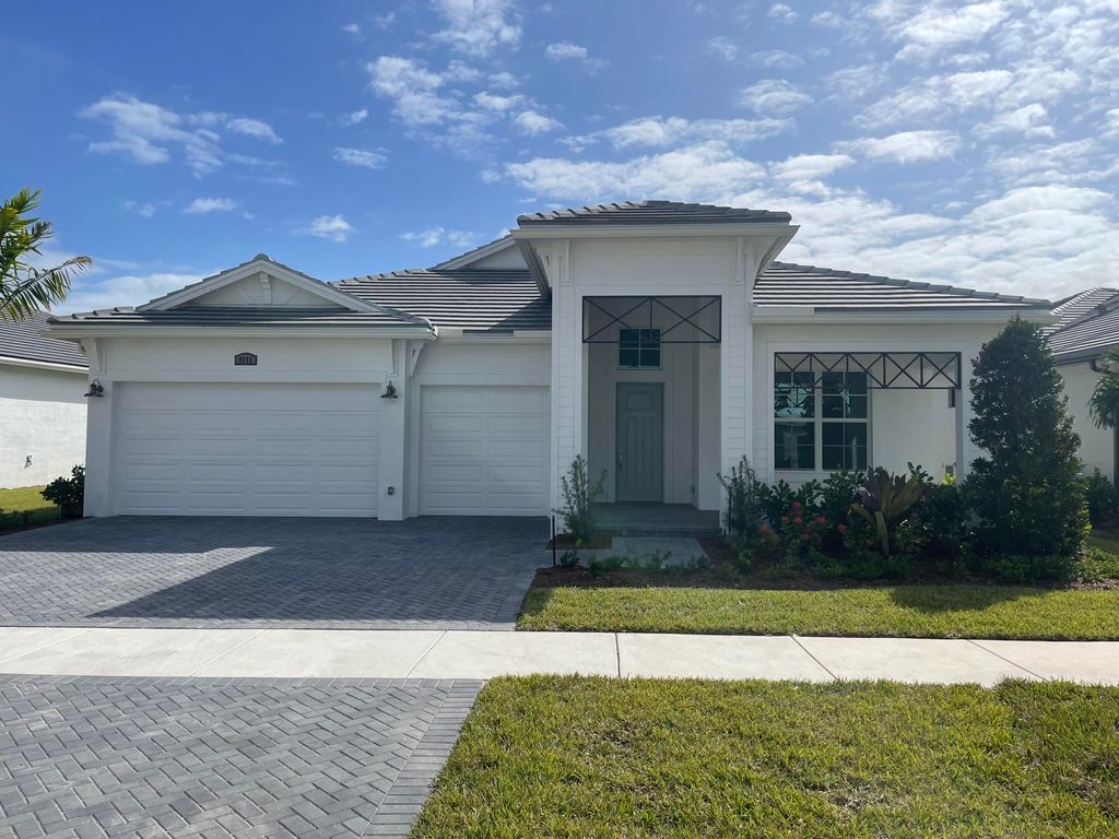 Photo of 9175 SW Arco Way, Port St Lucie, FL 34987 (MLS # R10939510)