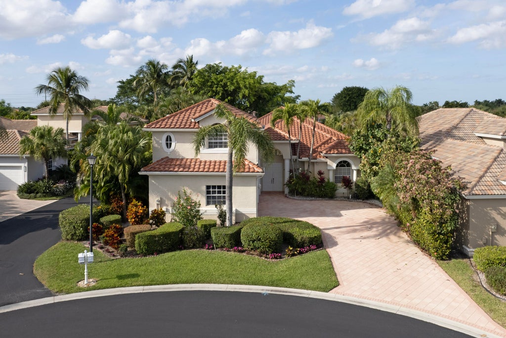 Photo of 10726 Greenbriar Villa Drive, Lake Worth, FL 33449 (MLS # B26044784)