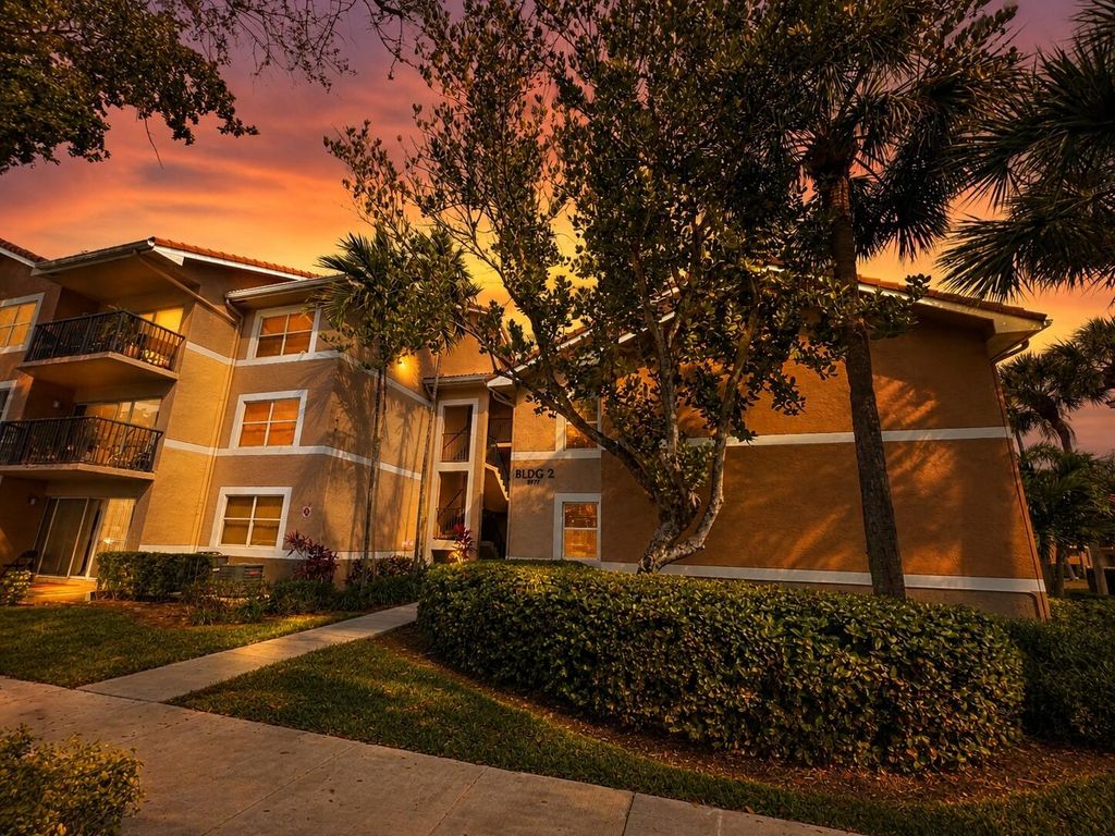 Photo of 8977 Wiles Road #206, Coral Springs, FL 33067 (MLS # B26023292)