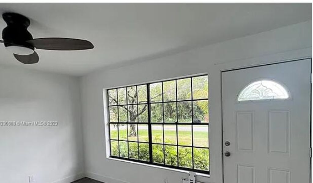 Photo of 841 NW Riverside Drive, Port Saint Lucie, FL 34983 (MLS # R11162783)