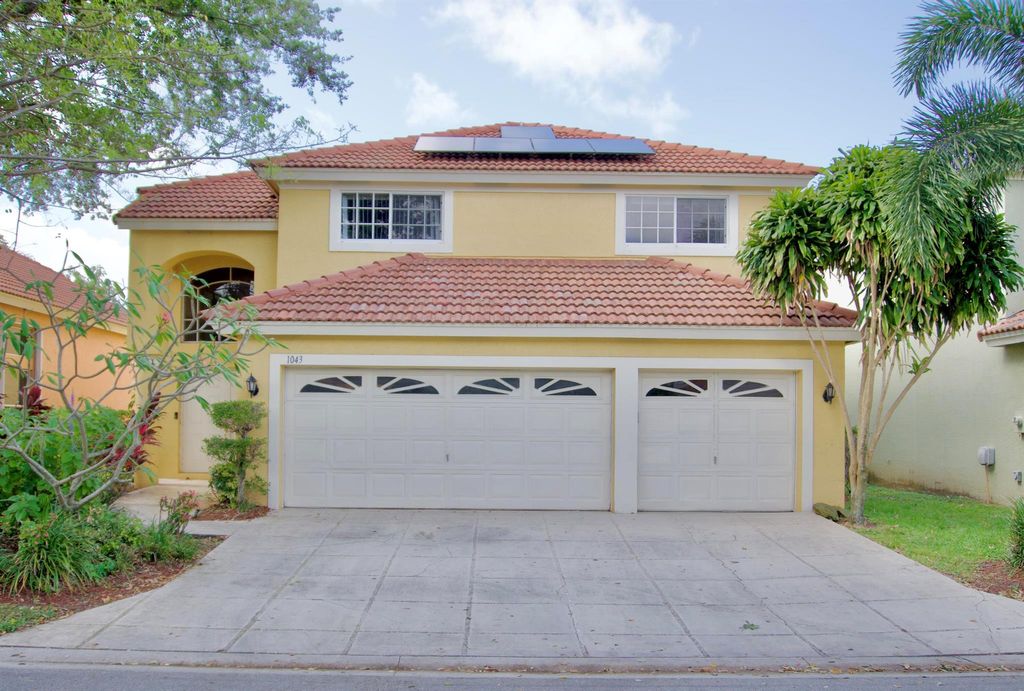 Photo of 1043 Aspri Way, Riviera Beach, FL 33418 (MLS # R10983822)