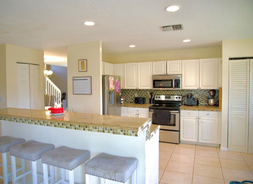 Photo of 1043 Aspri Way, Riviera Beach, FL 33418 (MLS # R10983822)