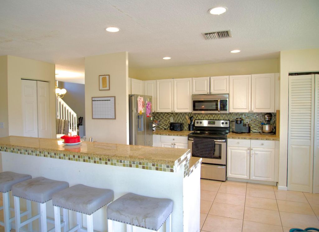 Photo of 1043 Aspri Way, Riviera Beach, FL 33418 (MLS # R10983822)