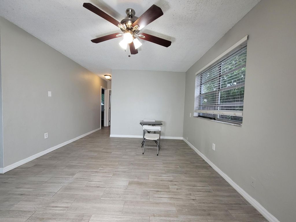 Photo of 920 NW 22nd Road, Fort Lauderdale, FL 33311 (MLS # R11159806)