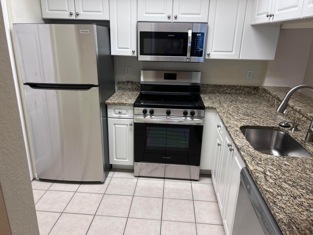 Photo of 2802 Sarento Place #302, Palm Beach Gardens, FL 33410 (MLS # R11004300)