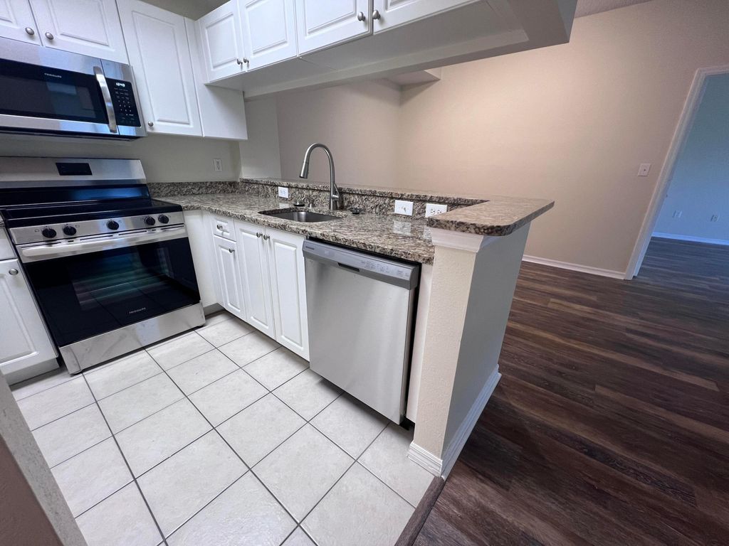 Photo of 2802 Sarento Place #302, Palm Beach Gardens, FL 33410 (MLS # R11004300)