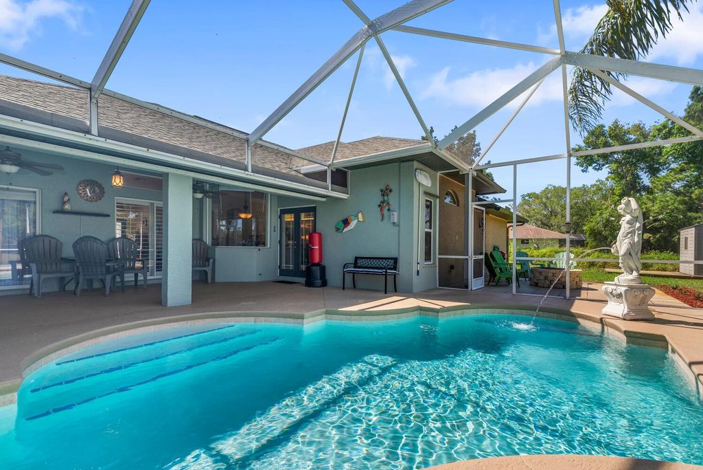 Photo of 1157 SW Jacqueline Avenue, Port St Lucie, FL 34953 (MLS # R10872550)