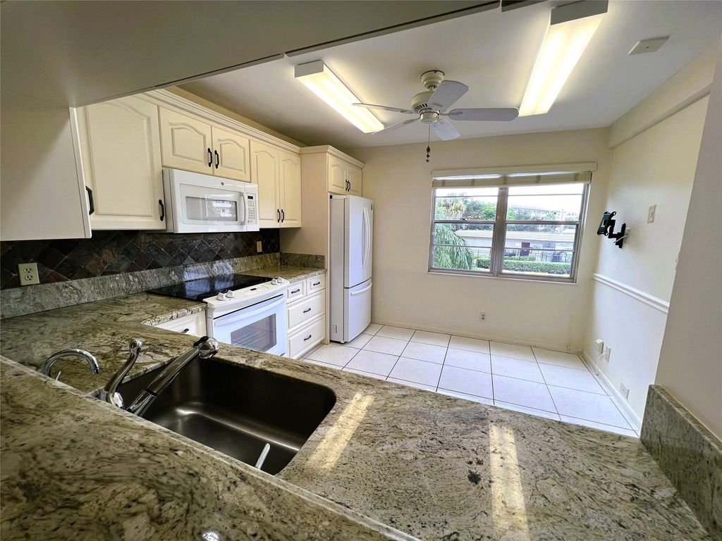 Photo of 3402 Bimini Lane #M-2, Coconut Creek, FL 33066 (MLS # F10408460)