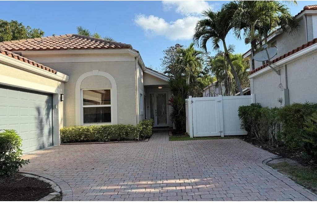 Photo of 6165 NW 77th Place, Parkland, FL 33067 (MLS # B26057223)