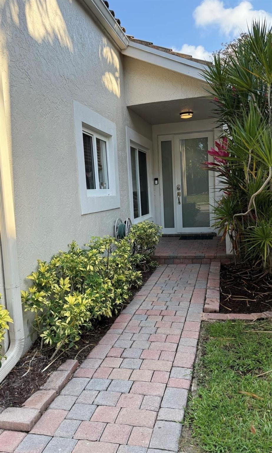 Photo of 6165 NW 77th Place, Parkland, FL 33067 (MLS # B26057223)