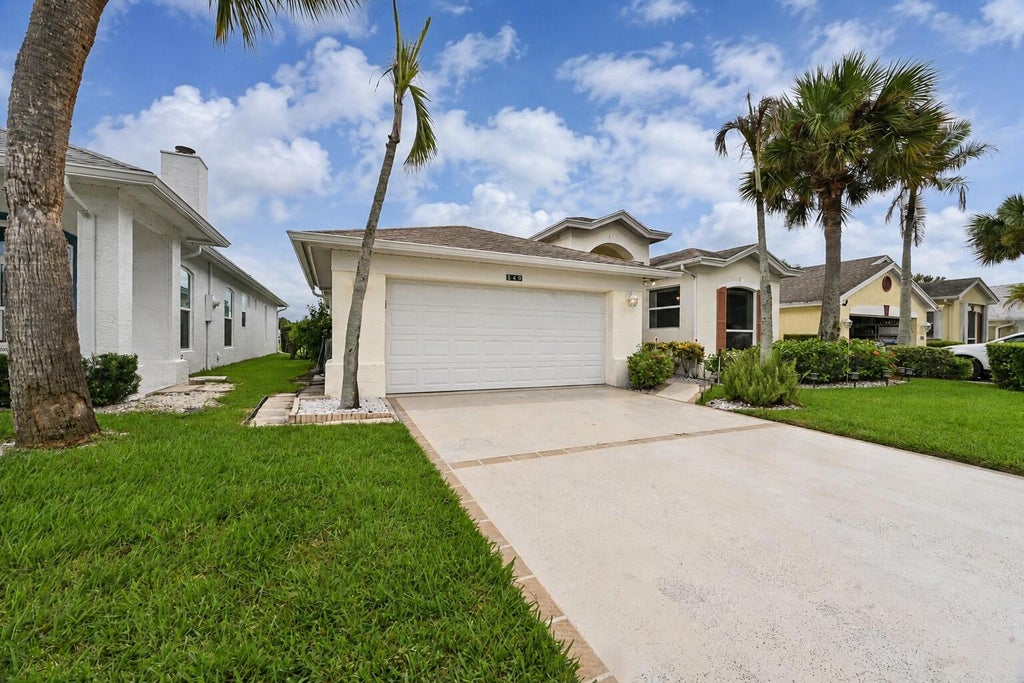 Photo of 540 NW Lambrusco Drive, Port Saint Lucie, FL 34986 (MLS # B26073569)