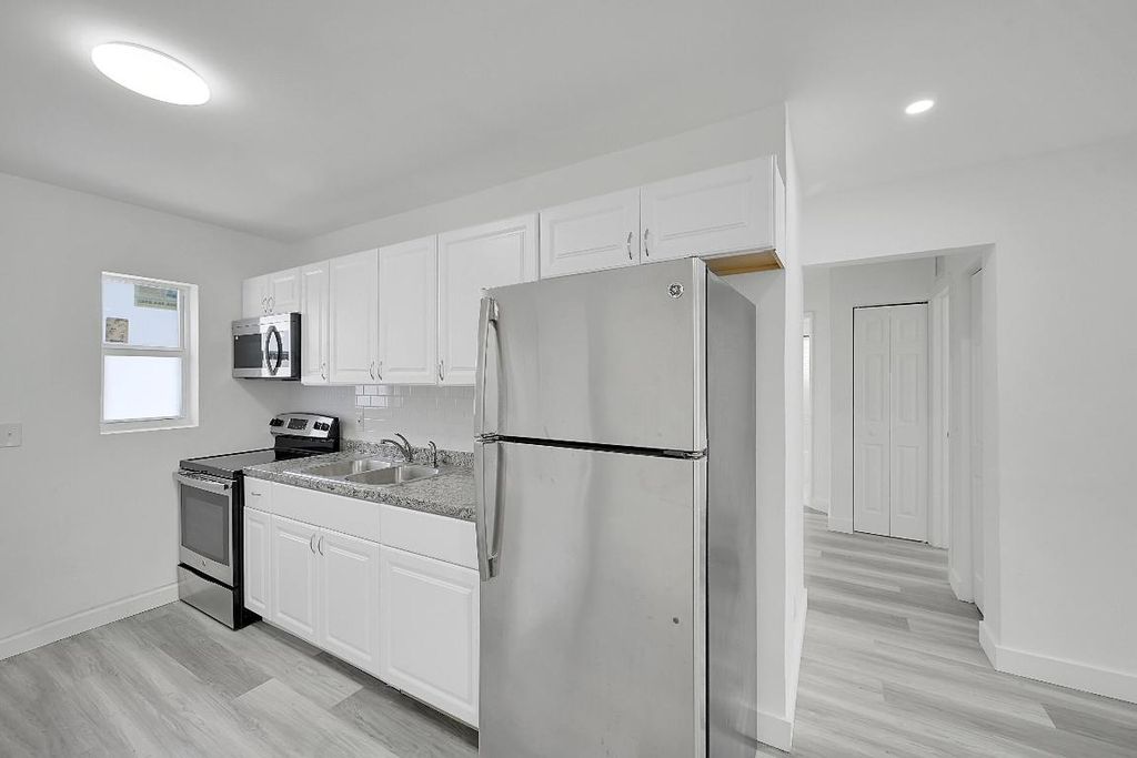 Photo of 1157 W 36th Street #1, Riviera Beach, FL 33404 (MLS # R11151765)