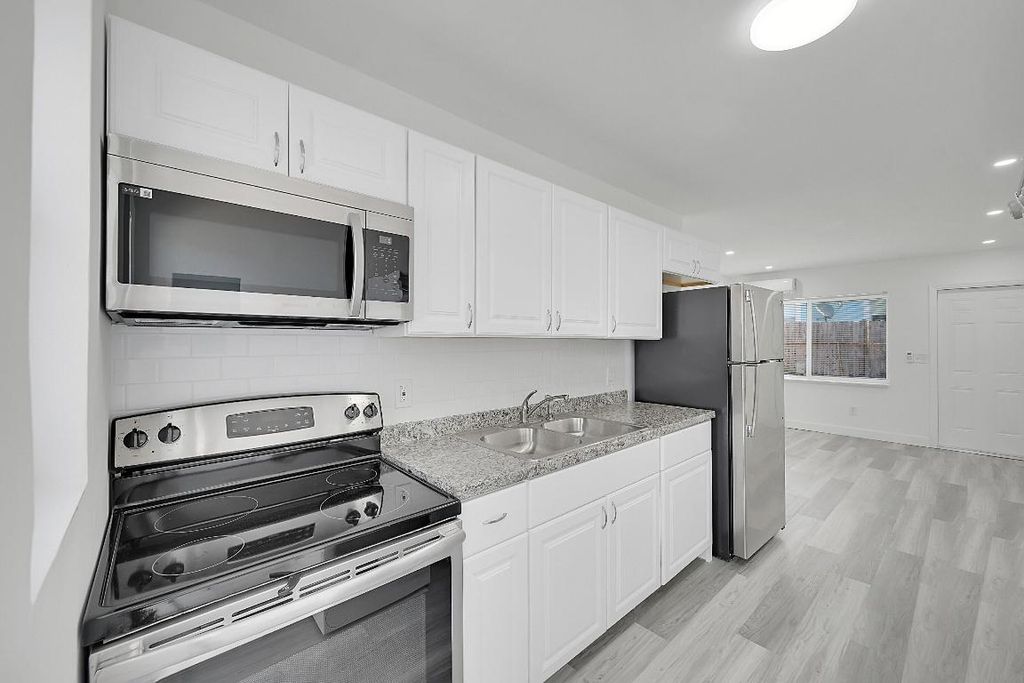 Photo of 1157 W 36th Street #1, Riviera Beach, FL 33404 (MLS # R11151765)