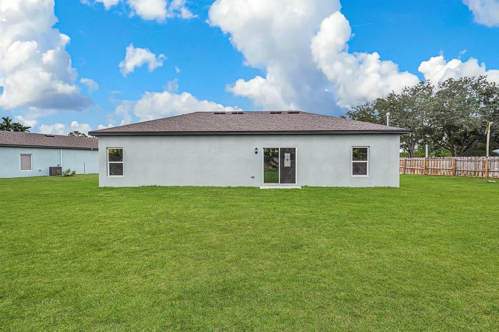 Photo of 2081 SW Savage Boulevard, Port Saint Lucie, FL 34953 (MLS # F10513313)