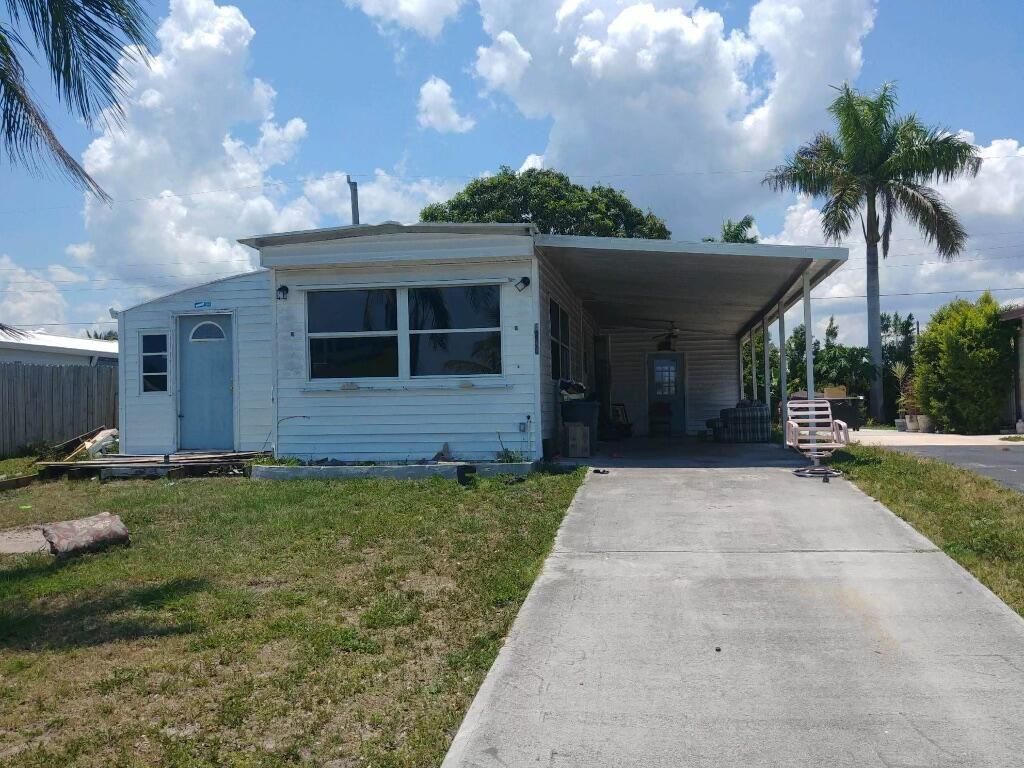 Photo of 8450 SE Eagle Avenue, Hobe Sound, FL 33455 (MLS # R10803937)