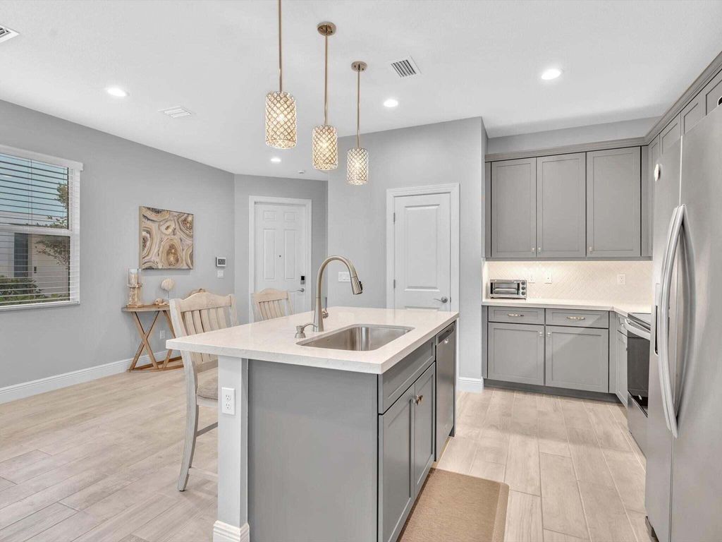 Photo of 1835 Sandpiper Pointe Place, Deerfield Beach, FL 33442 (MLS # B26019142)