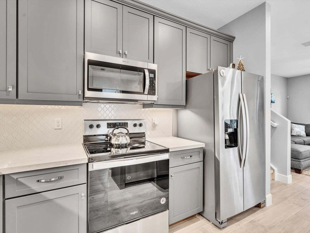 Photo of 1835 Sandpiper Pointe Place, Deerfield Beach, FL 33442 (MLS # B26019142)