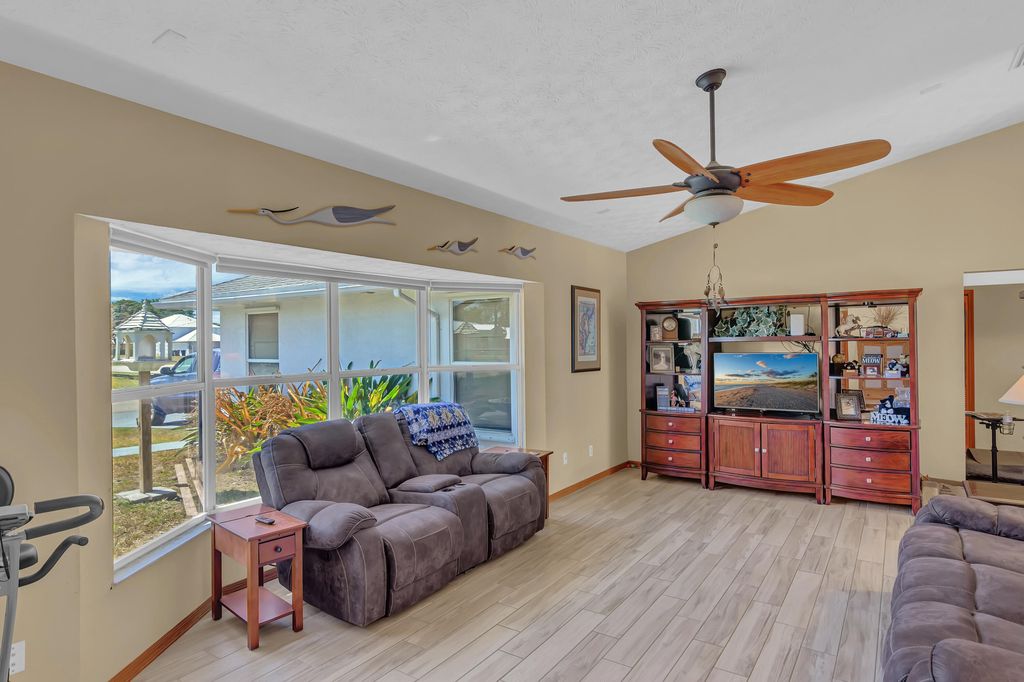 Photo of 4501 SW Floral Street, Port Saint Lucie, FL 34953 (MLS # R10977779)