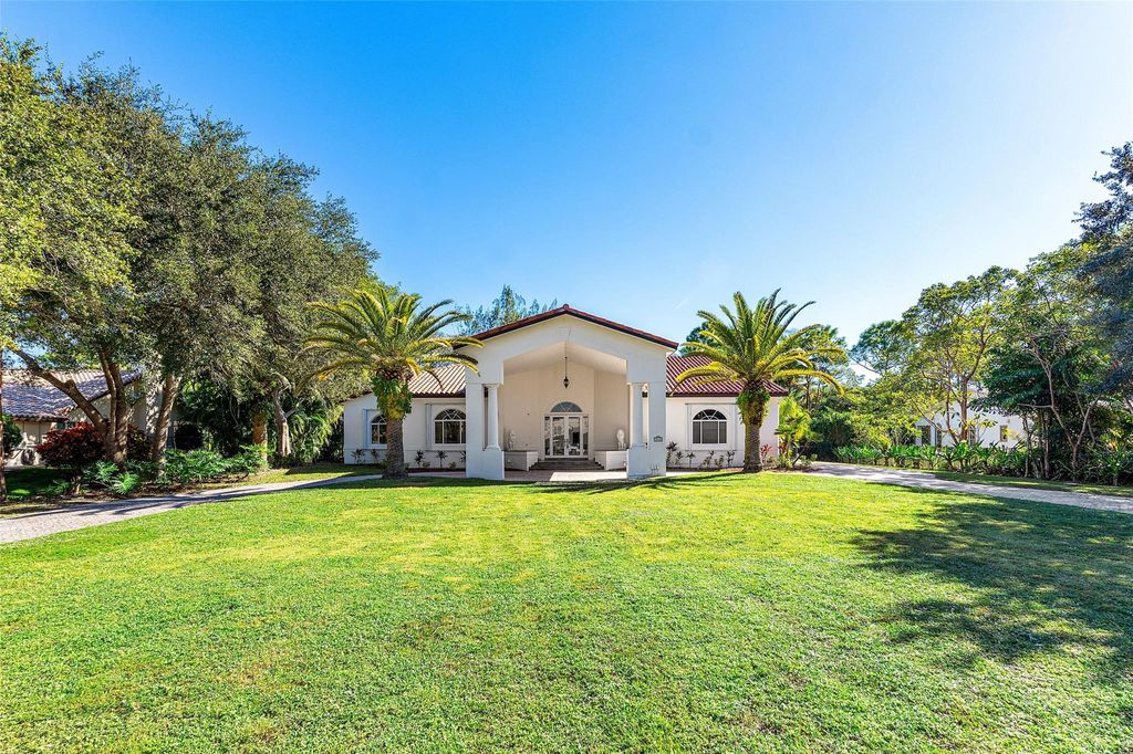 Photo of 7132 NW 62nd Ter, Parkland, FL 33067 (MLS # F10537496)