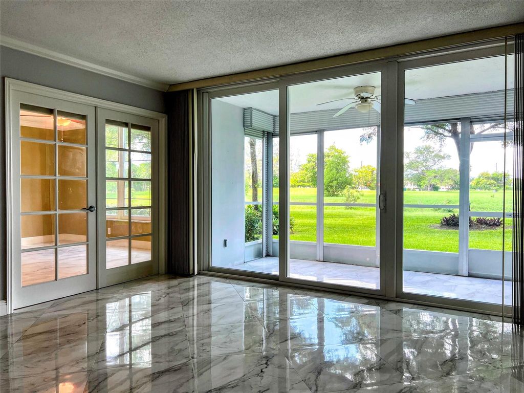Photo of 3080 N Course Drive #108, Pompano Beach, FL 33069 (MLS # F10527959)