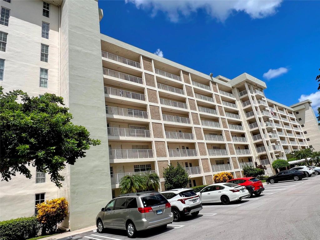 Photo of 3080 N Course Drive #108, Pompano Beach, FL 33069 (MLS # F10527959)