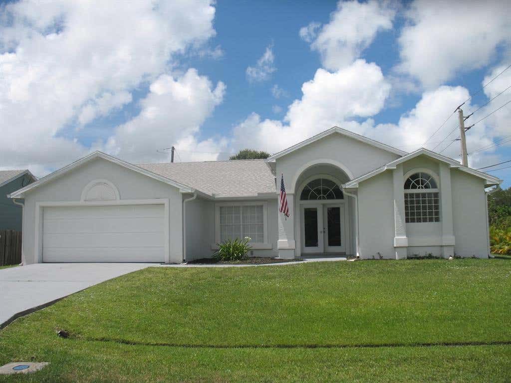 Photo of 101 SW Eyerly Avenue, Port Saint Lucie, FL 34983 (MLS # R10814437)