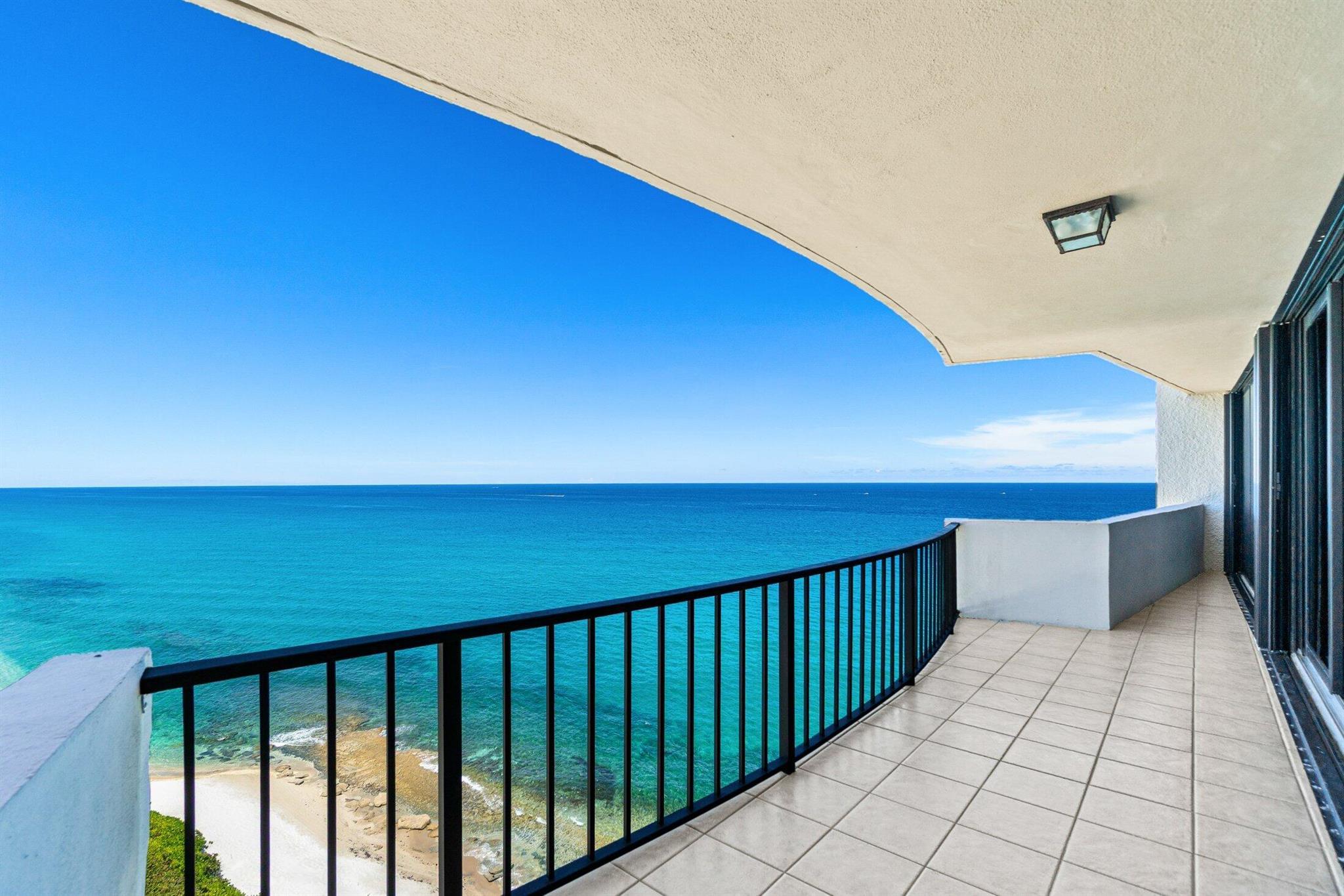 CORENER UNIT IN TOWER 1, CLOSEST TO THE OCEAN! Panoramic ocean views from 16th floor 2 BR condo. 2 beautifully remodeled 2025 baths, updated kitchen, custom quartz counter w additional storage, full size washer/dryer. Expansive living area w stunning ocean view. Enjoy a private kitchen balcony plus panoramic balcony views from both bedrooms & the living area. Primary suite has walk-in closet w custom built-ins & blackout curtains. Offered UNFURNISHED, newer carpet in the bedrooms. Covered parking spot #183 included. The GATED community boasts resort-style amenities: heated swimming pool, tennis courts, fitness center, sauna, community room, private beach access, and on-site management. Rental insurance required. No smoking in unit or on balconies.